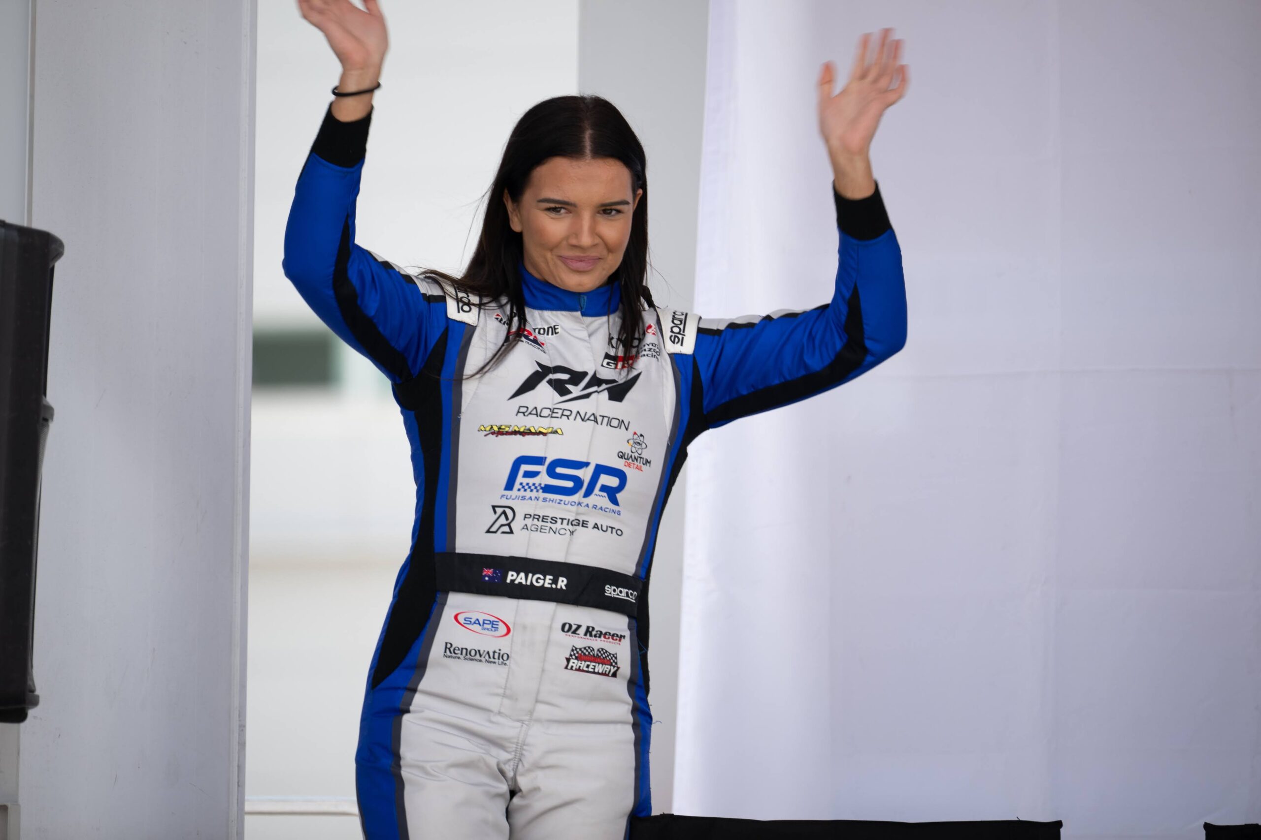 Paige Raddatz celebrating in her KYOJO CUP race suit — 2026 season